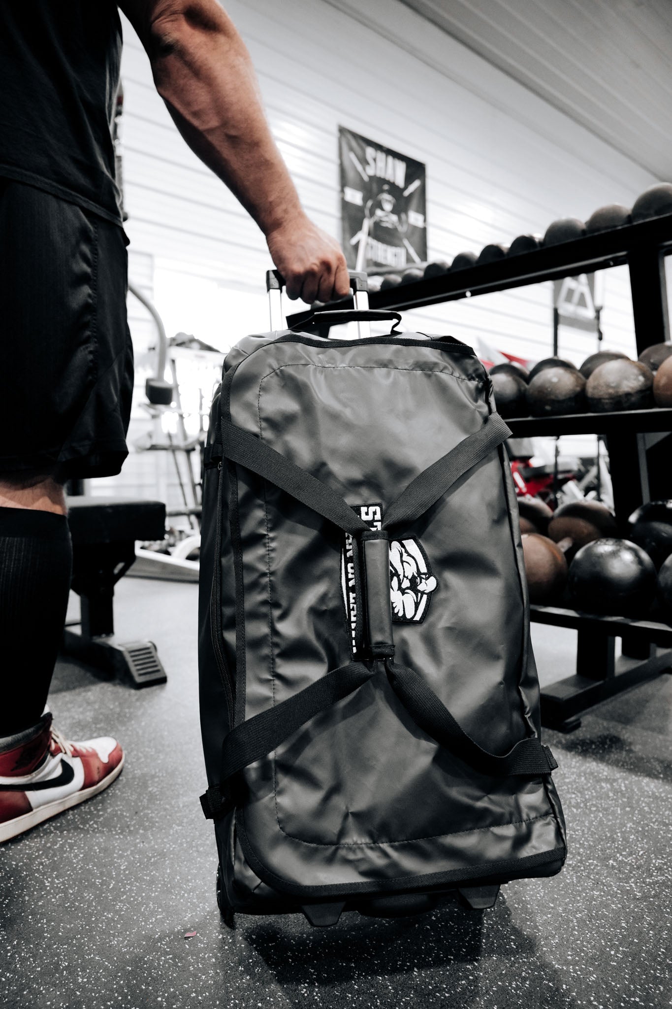 STRONGEST MAN ON EARTH ROLLER BAG