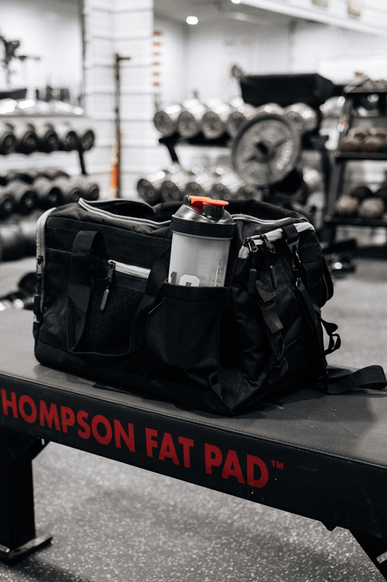 STRONGEST ARM ON EARTH Gym Duffel Bag by Brian Shaw
