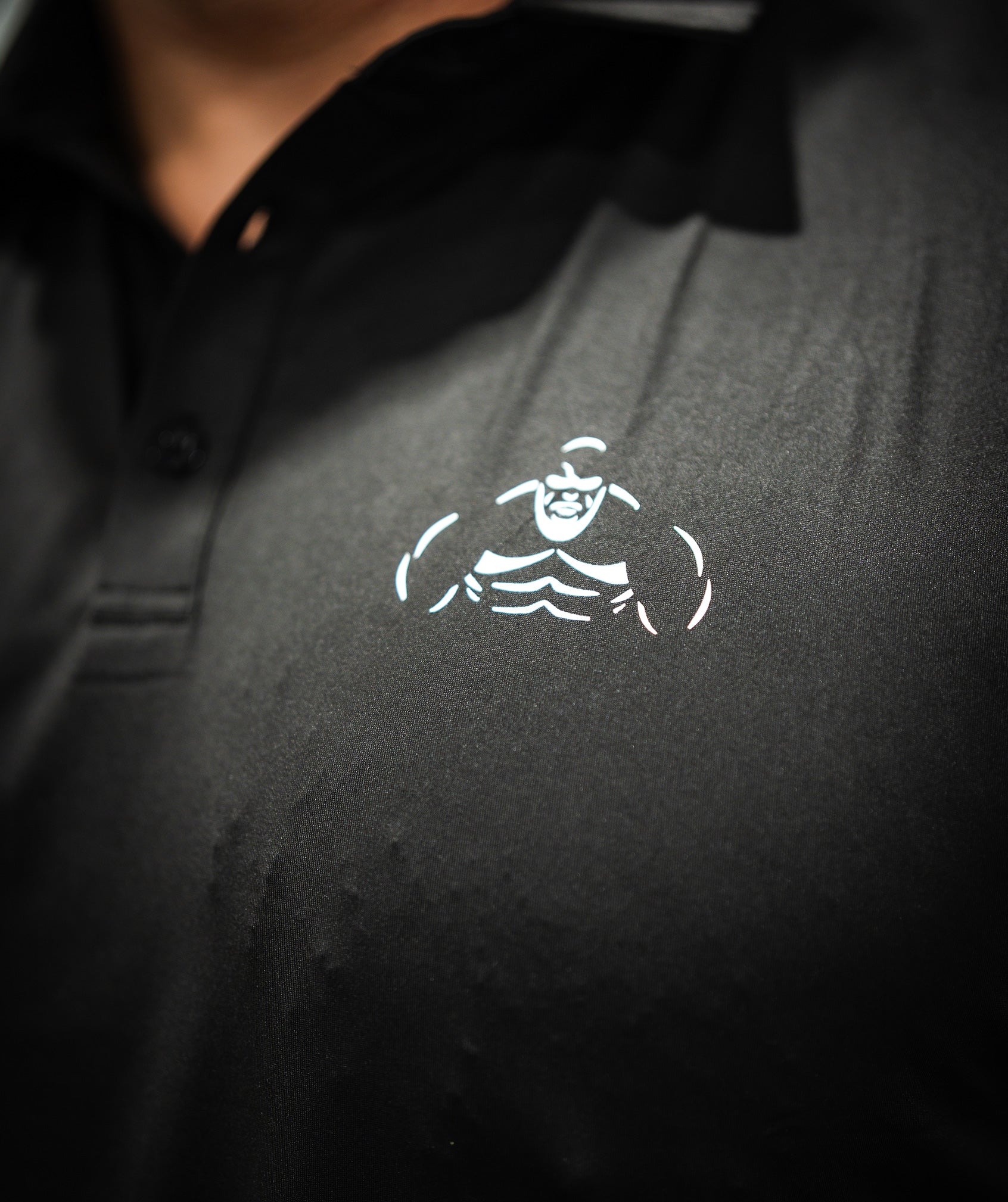 Brian Shaw Wearing a polo shirt