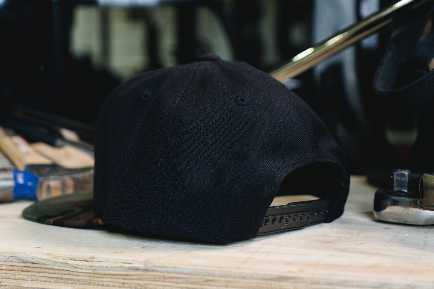 STRONGEST MAN ON EARTH SNAPBACK HAT