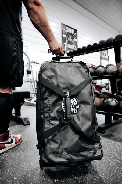 STRONGEST MAN ON EARTH ROLLER BAG