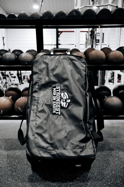 STRONGEST MAN ON EARTH ROLLER BAG