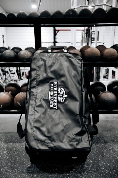 STRONGEST MAN ON EARTH ROLLER BAG