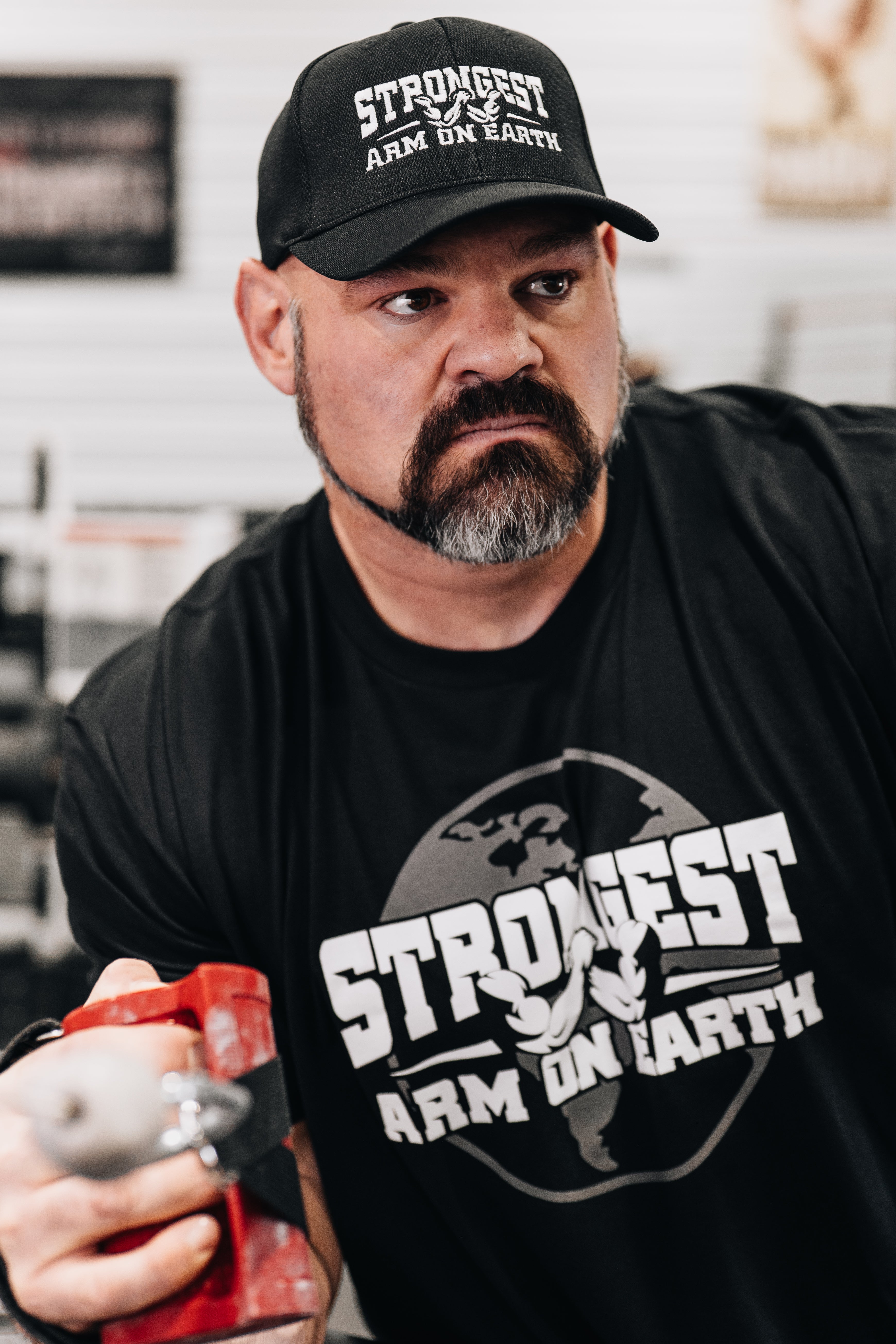 STRONGEST ARM ON EARTH T-SHIRT