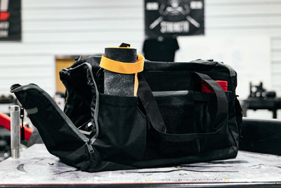 STRONGEST ARM ON EARTH Gym Duffel Bag by Brian Shaw