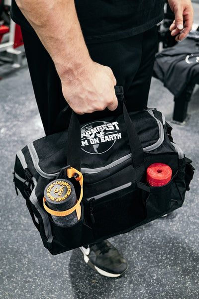 STRONGEST ARM ON EARTH Gym Duffel Bag by Brian Shaw