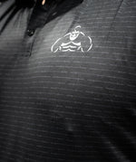 Brian Shaw Wearing a polo shirt
