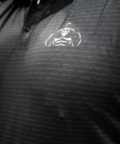 Brian Shaw Wearing a polo shirt