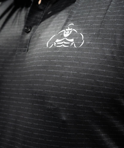 Brian Shaw Wearing a polo shirt