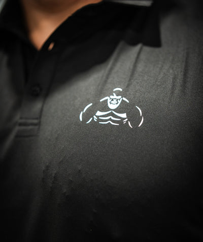 Brian Shaw Wearing a polo shirt