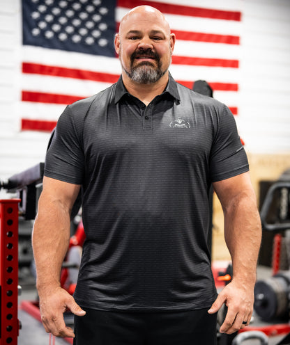 Brian Shaw Wearing a polo shirt