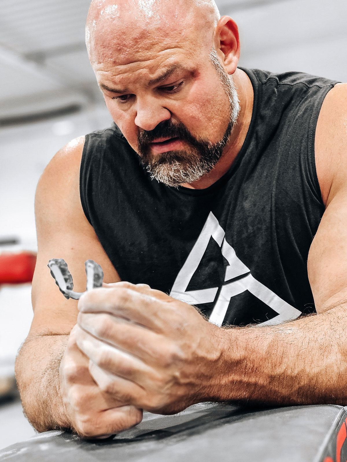 Brian Shaw holding Airwaav Shaw Strength Mouthpiece