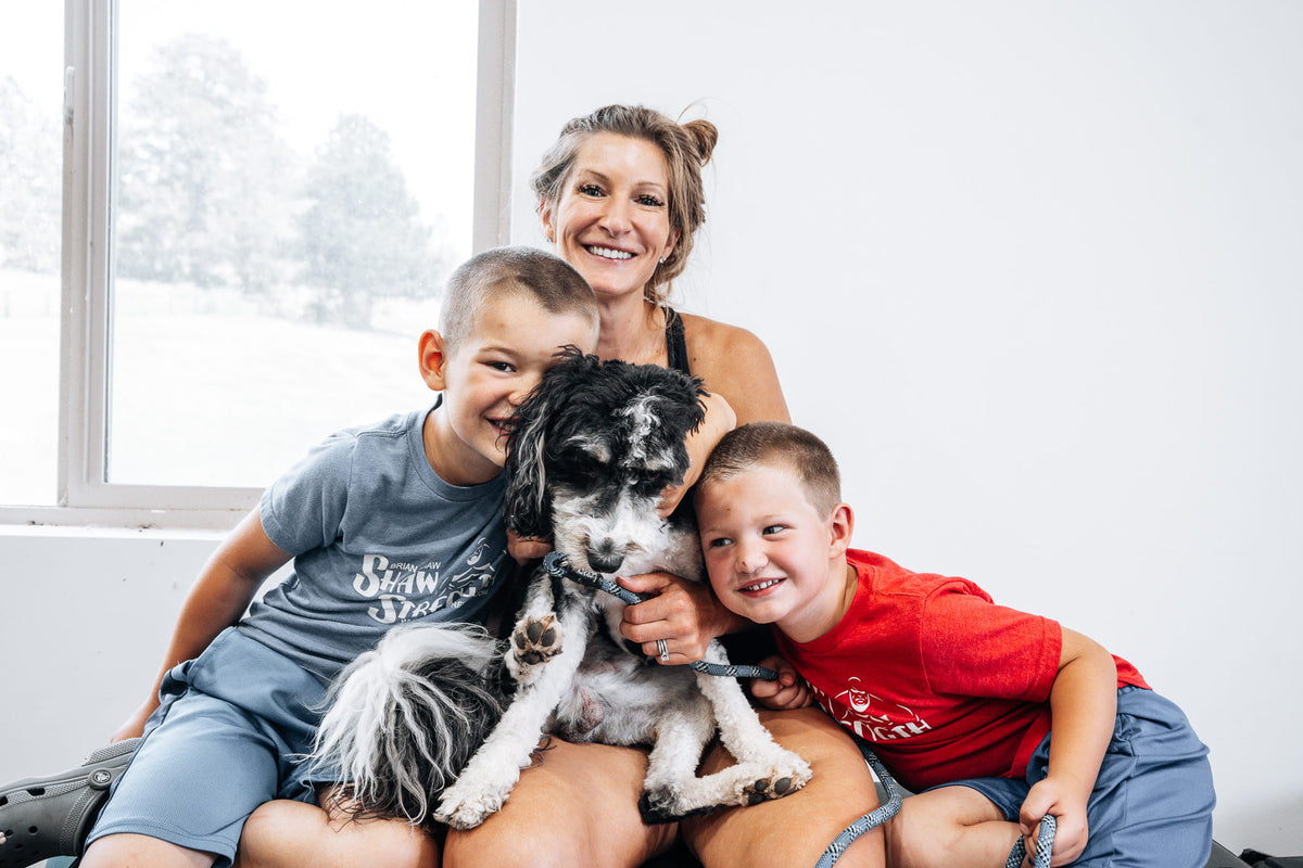 Keri Shaw with their two sons and the family dog
